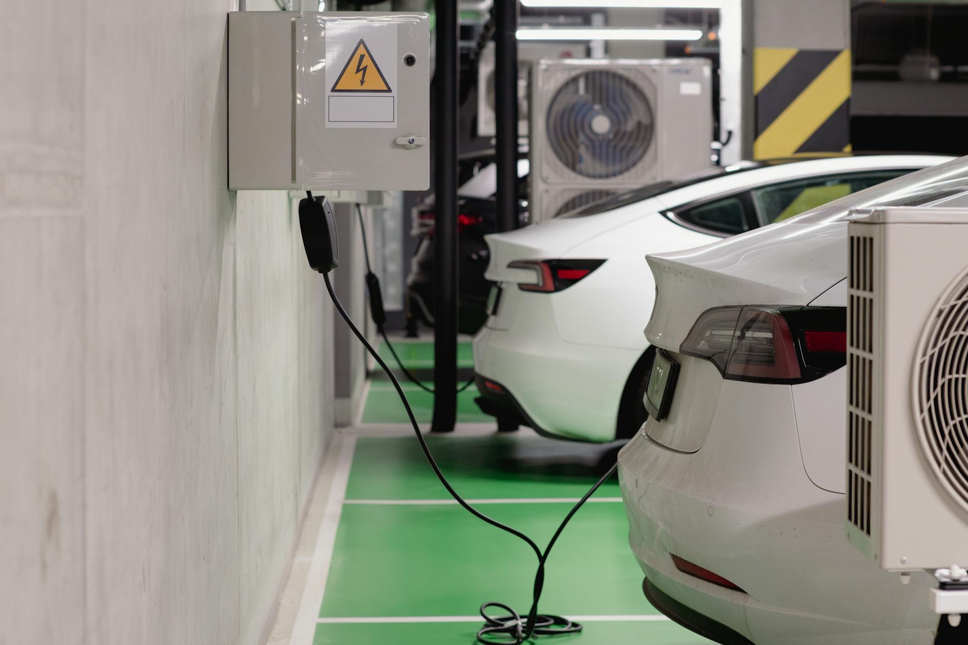 EV cars at charging station – Representing the Cheapest EV Cars in India 2025